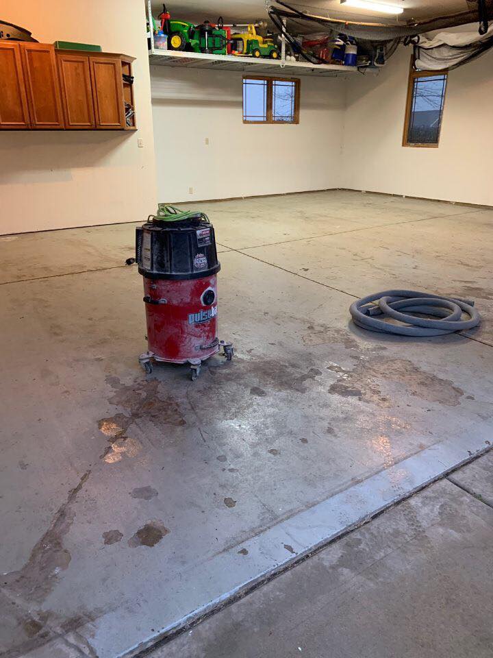 Here you can see our shop vac that we use to vacuum any loose debris. This is a crucial step that we complete prior to installing our Polyurea Base Coat! 