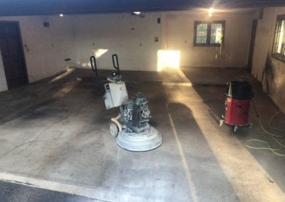 Our 1 Day Coatings product line is, in our professional opinion (slightly biased), the best industrial floor coating product on the market. We can install our products in just one day and provide our clients with both a 5-year Commercial & 15-year Residential warranty. On the flip side, there are many products that you can purchase "over the counter" at places like Lowes & Home Depot. Many of these "off brands" will give you an installation guide which makes the buyer feel empowered and capable of doing it themselves. Unfortunately, most home owners quickly discover that applying floor coatings by themselves is harder than it appears. Problems often arise within a time period of a few months to a few years. Flaking, Chipping or De-laminating are the most common issues that we see in the field. Manufacturers of these off-brand products do not provide their clients with a warranty. They can hind behind the mask of "not professionally installed." This leaves the home owner holding the bill - with wasted product and a surface that is difficult to remove. It's a frustrating circumstance and one that we see too often in our industry. Here you can see the old Kool Deck system. Our client was experiencing peeling and chipping and contacted us to replace this existing floor system with our 1 Day Coatings product. Removing an Old & Chipping Kool Deck Coating This week, our teams removed a Chipping Kool Deck system from a back patio / pool deck. This home owner contacted us after they began to experience the same issues listed above. It's applied correctly, Kool Deck is a wonderful product that provides many benefits to clients. For starters, it helps to cool the patio surface - which in Texas is a very nice benefit! However, like all products, if they are not installed correctly (or if the product naturally starts to fail) they no longer become viable. Our client contacted us and requested for us to remove this Kool Deck system and install our 1 Day Coatings product instead. We were happy to fulfill this request and completed the project in just one day! As you can see from the image above, our products provide a nice, smooth finish. Clients often refer to our system having an "orange-peel" like texture to it. It's softer surface and higher surface traction creates a perfect surface for our clients to walk on barefoot. Our 1 Day Coatings product is extremely comfortable to walk on and provides long lasting benefits to our clients. Backed by a 15-year residential warranty, it's hard not to see how our products are more comfortable, stronger and a better all around choice! We've Got The Tools: Commercial Floor Grinders Removing a Kool Deck system (or any other system for that matter) requires some elbow grease and the right hardware. Because Kool Deck and other systems are applied with an epoxy bond coat, they have to be mechanically removed. We've invested some serious capital into industrial floor grinders so we can remove all types of durable surfaces. Trust us, we see these types of floor coatings all the time! In fact, we are used to removing stubborn epoxy floor coatings and have done it on dozens of occasions. You might say that removing low quality floor coatings and replacing them with our high quality industrial floor coating is a specialty of ours! Our Installation Process: Remove, Repair, Clean & Install So, first things first - we utilize our commercial floor grinder to evenly remove the existing floor coating. We grind the floors evenly until we get down to a fresh layer of concrete - which is what our polyurea basecoat adheres to. After the floor is ground down to a fresh layer of concrete we then look for defects and begin the repair process. Utilizing our CR Mender Repair System, we can fill and repair a wide array of cracks, pits and joints. Our CR Mender helps to create a smooth surface for our products to adhere to. It's also the perfect time for us to repair your concrete and spot treat areas where failures may appear. Thirdly, once we've repaired the concrete with the CR Mender, we can then clean the surface and apply our Polyurea Basecoat. This polyurea basecoat is highly durable and adheres to the fresh concrete - creating a solid bond coat. From here we distribute our Vinyl Chip Flakes and seal our finished product with our Polyurea Top Coat. We Can Install on All Types of Surfaces Our 1 Day Coatings product is brilliant because it can be installed on a wide array of surfaces. From pool deck coatings (such as this) to industrial floors and commercial kitchens - we've done it all! In fact, our clients love our products so much because it enhances their ability to enjoy their lives without worrying about their floors. We provide our clients with an industrial floor coatings that won't chip, peel or flake due to any of the following criteria: AbrasionsDropsChemicalsUV LightFoot TrafficScrapes or Scratches Overall, it is a very simple product in regards to technicality, but it requires attention to detail and familiarity with installation. We've installed literally hundreds of Vinyl Chip Systems and have created some amazing results! For a portfolio of our work - check out both our Blog & Photo Gallery. Here you can see for yourself how we've made the difference in our clients homes, offices and commercial settings!